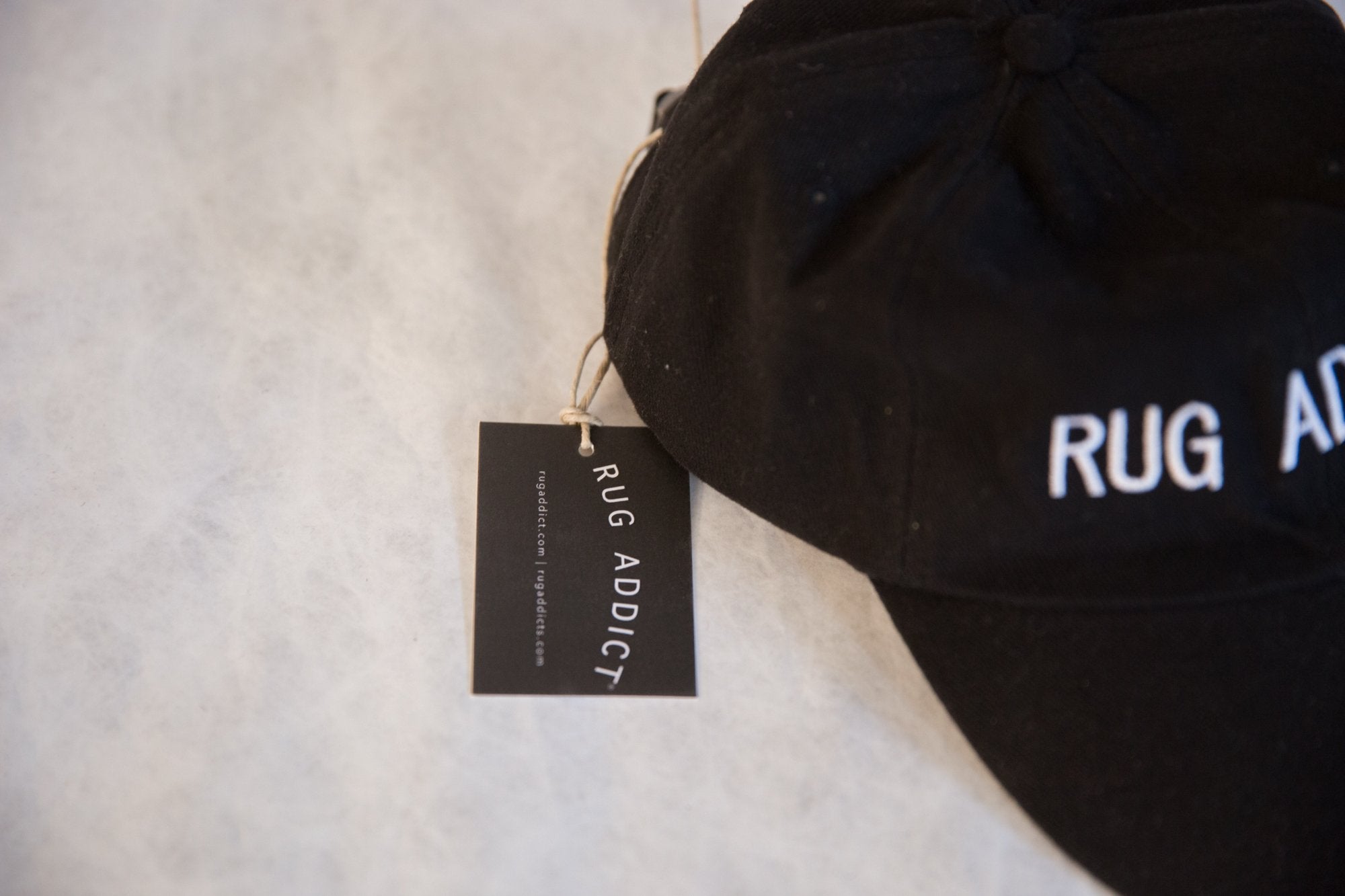 Unisex Black Block Letter Rug Addict Embroidered Hat